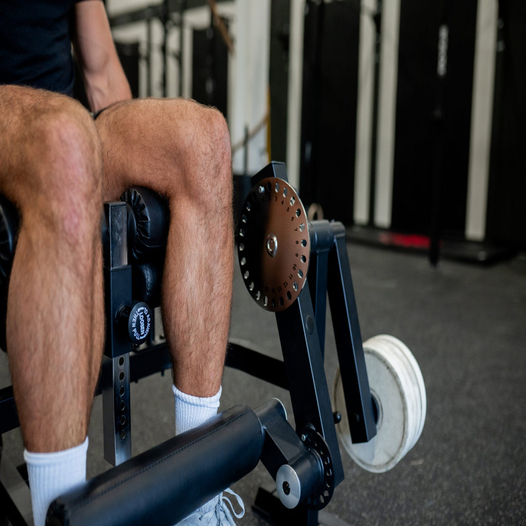 Plate Loaded Leg Ext. / Curl Machine